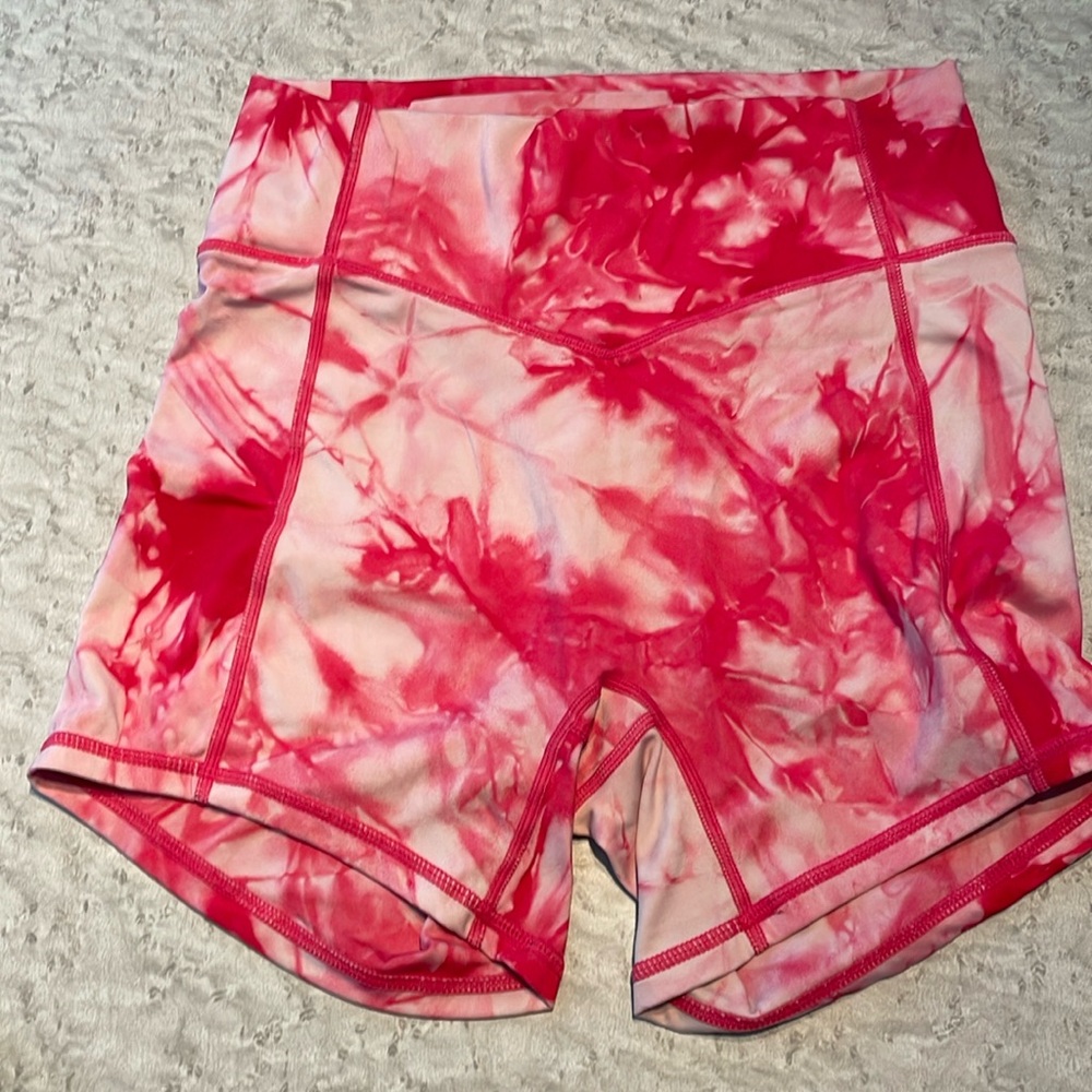 Pink tie-dye spandex shorts